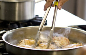 How to keep food from sticking to stainless steel pan